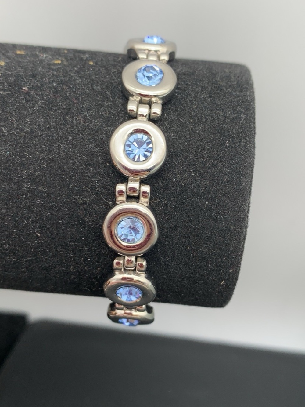 Silver-Tone tennis style Bracelet with Light Blue Crystal Accents